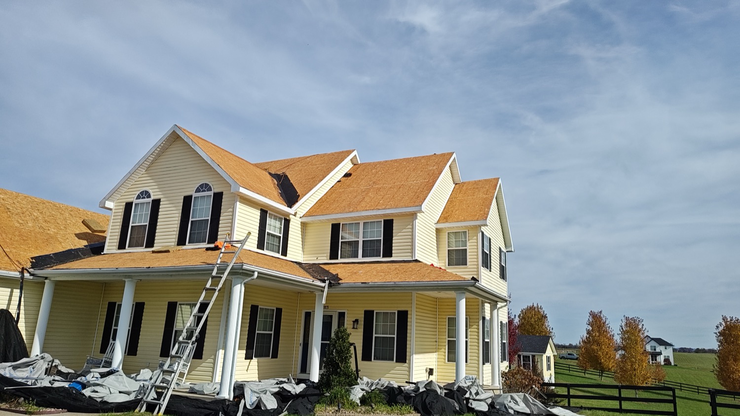 Gendir Roofing crew working on a Cincinnati roof replacement