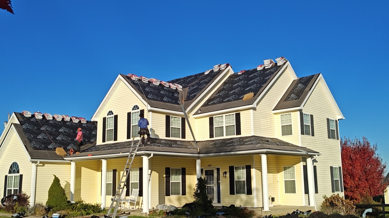Gendir Roofing crew working on a Cincinnati roof replacement