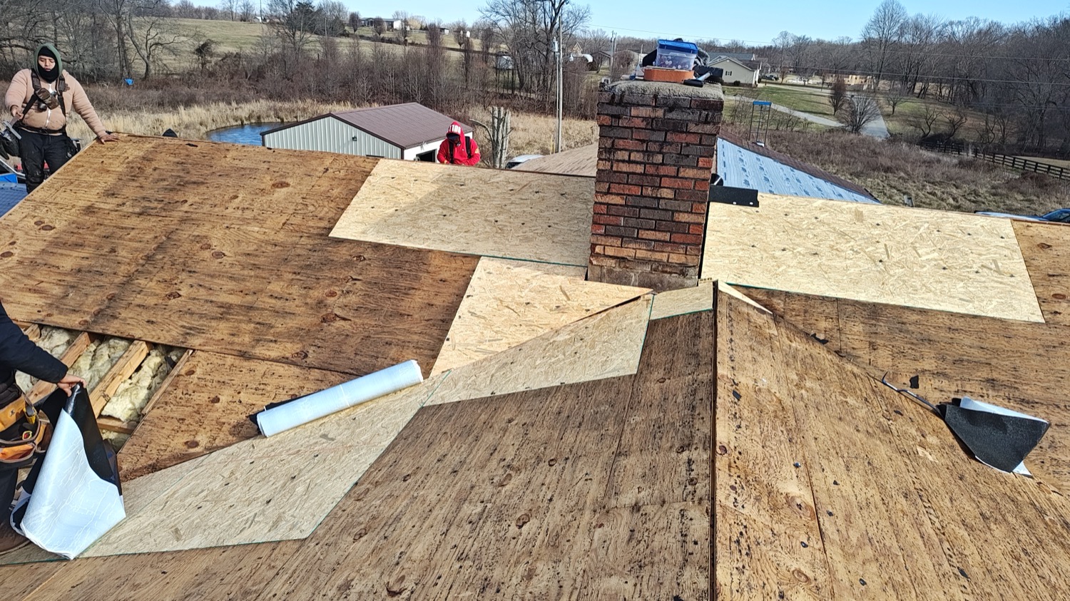 Storm-damaged roof torn down to the deck in Cincinnati